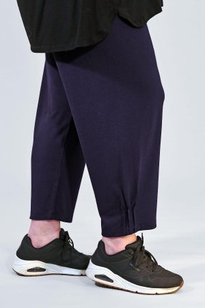 The model in this photo is wearing navy Masai Patti harem trousers