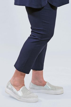 The model in this photo is wearing lightweight Mona Lisa navy crop trousers