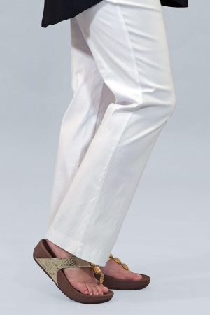 The model in this photo is wearing white Mona Lisa straight leg stretch trousers