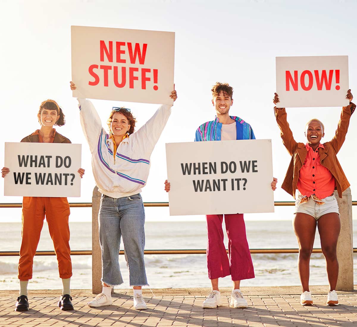 Young people with placards, jokey demands for new stuff, now