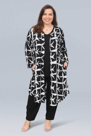 The model in this photo is wearing an Angel Circle long jacket in a funky abstract print teamed with Noen harem pants in larger sizes at Bakou