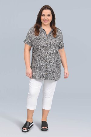 The model in this photo is wearing a silky soft short sleeved shirt by plus size specialists Ciso at Bakou