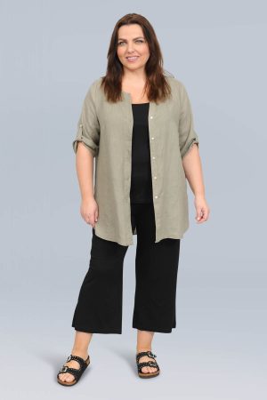 The model in this photo is wearing a cool long linen shirt by Doris Streich at Bakou London