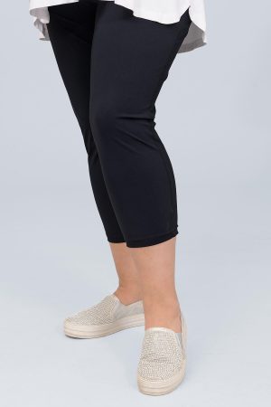 The model in this photo is wearing navy short leggings by Doris Streich at Bakou