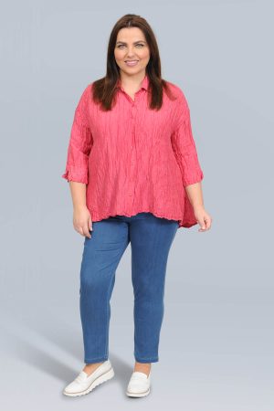The model in this photo is wearing a luxurious Grizas silk and linen shirt in plus sizes at Bakou London