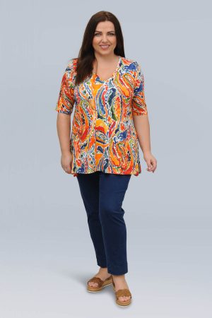 The model in this photo is wearing a groovy A-line abstract print t-shirt from German plus size specialists K J Brand at Bakou London