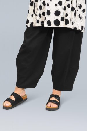 The model in this photo is wearing fun and funky K J Brand barrel leg stretch trousers from plus size specialists Bakou London