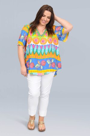 The model in this photo is wearing a beautiful bright and feminine Summer top by Australian brand Orientique at Bakou London