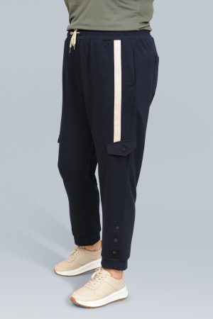 The model in this photo is wearing a pair of Pont Neuf Elba joggers in plus sizes at Bakou London