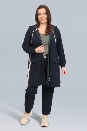 The model in this photo is wearing a Pont Neuf Gun tracksuit jacket in plus sizes at Bakou London