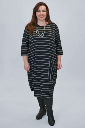 The model in this photo is wearing a jersey striped dress by Q'neel in plus sizes