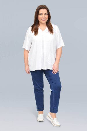 The model in this photo is wearing a gorgeous soft top by German designers See You with frayed edging in larger sizes for curvy girls available from Bakou London