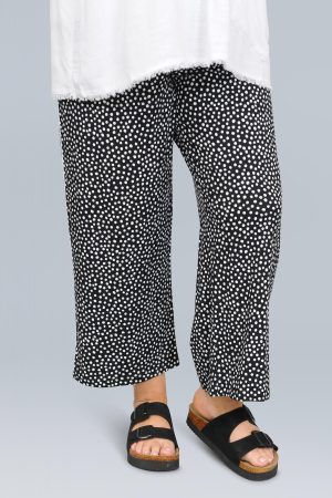The model in this photo is wearing a pair of jersey spotty crops by See You at Bakou London for large ladies clothing