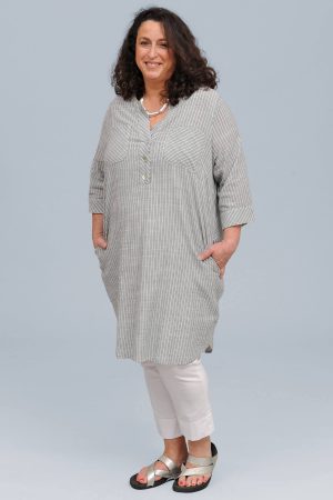 The model in this photo is wearing a striped cotton tunic/dress from Via Appia Due worn with Robell Bella cuff crops in white