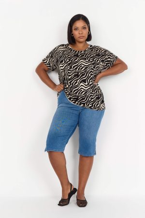 The model in this photo is wearing a funky animal print t-shirt from Wasabi Concept at Bakou London
